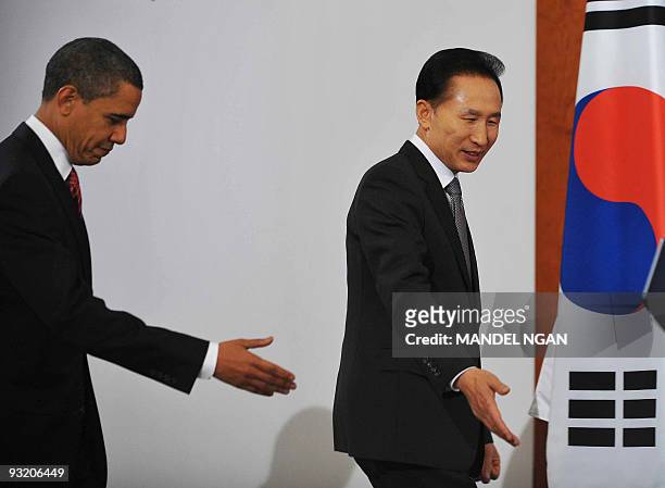 President Barack Obama and South Korean President Lee Myung-Bak make their way to a joint press conference after a bilateral meeting at the...
