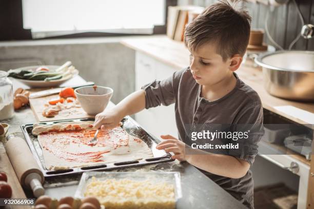 father's little bakers - making pizza stock pictures, royalty-free photos & images