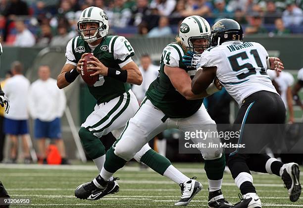 Mark Sanchez of the New York Jets looks to throw a pass against the Jacksonville Jaguars on November 15, 2009 at Giants Stadium in East Rutherford,...