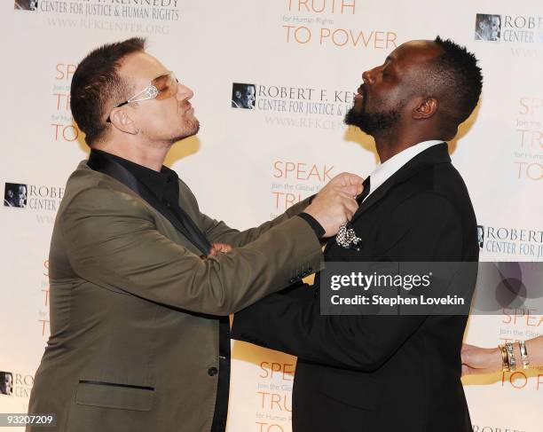 Singers Bono and Wyclef Jean attend the RFK Center Ripple of Hope Awards dinner at Pier Sixty at Chelsea Piers on November 18, 2009 in New York City.