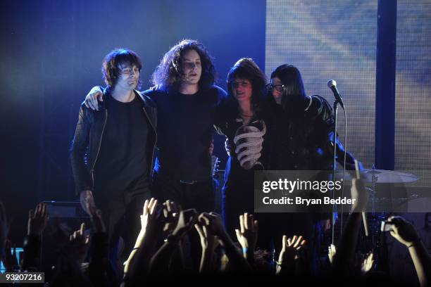 Musicians Dean Fertita, Jack White, Alison Mosshart and Jack Lawrence of The Dead Weather perform onstage at the 2009 mtvU Woodie Awards at Roseland...