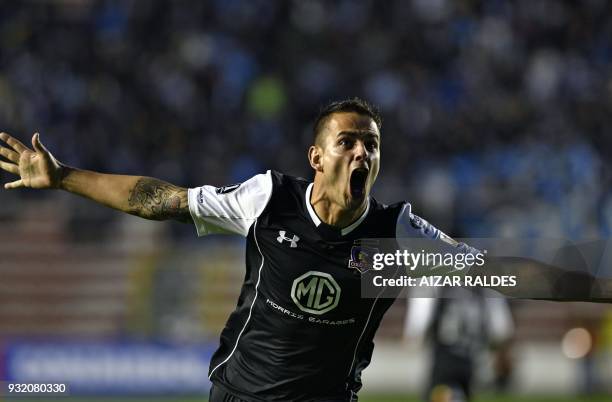 Raul Rivero of Chilean Colo Colo celebrates after scoring against Bolivia's Bolivar during their Copa Libertadores football match, at Hernando Siles...