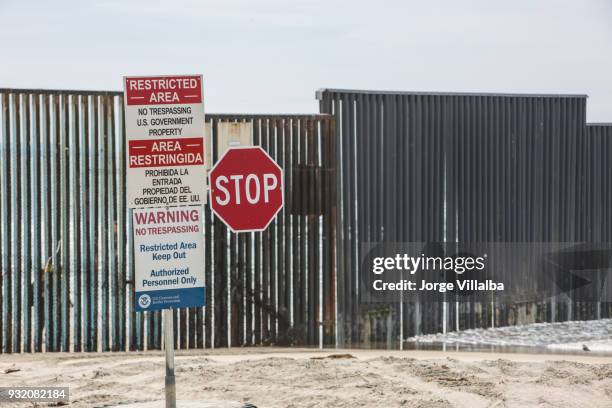 wall prototype along the mexican border line from mexico - mexico border wall prototypes stock pictures, royalty-free photos & images