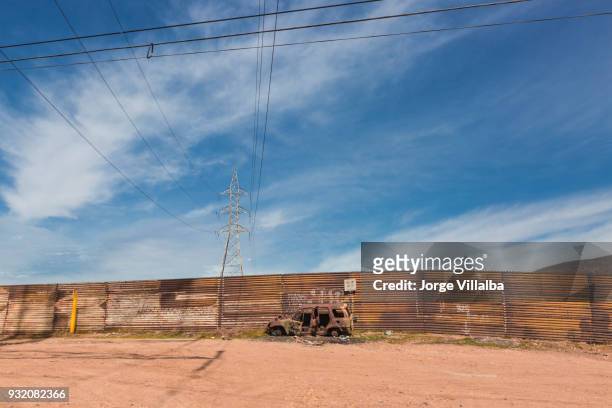 wall prototype along the mexican border line from mexico - mexico border wall prototypes stock pictures, royalty-free photos & images