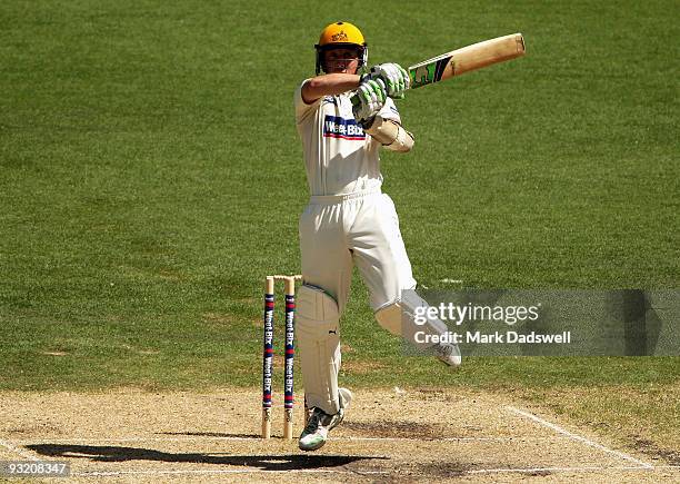 Luke Ronchi of the Warriors square drives during day three of the Sheffield Shield match between the Victorian Bushrangers and the Western Australian...