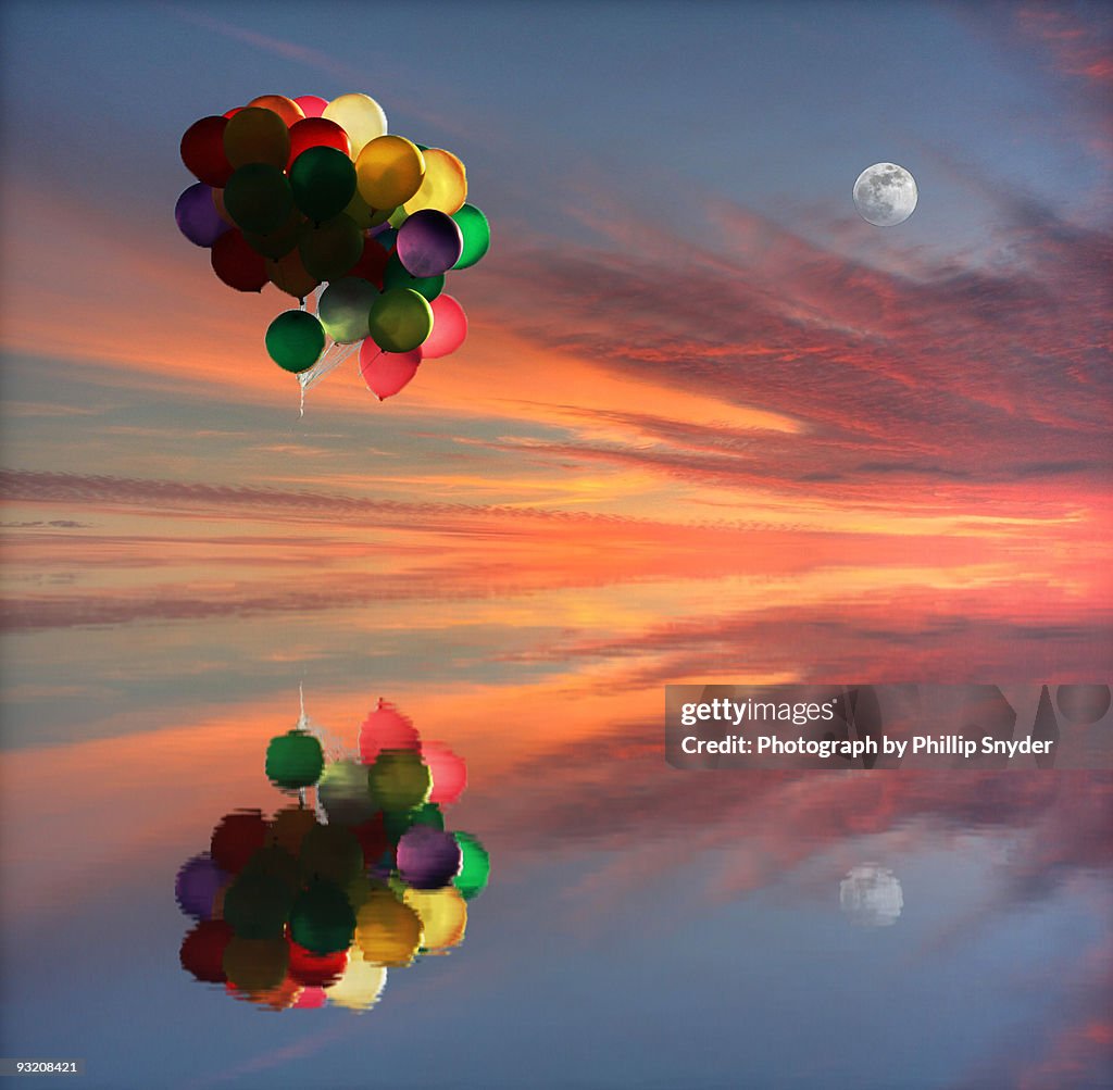 Bunch of floating balloons with reflection