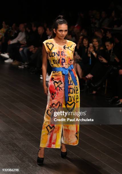 Fashion Model Kristina Menissov walks the runway at the Domingo Zapata Fashion Show at the Los Angeles Fashion Week 10th season anniversary at The...