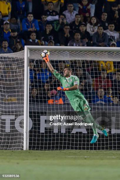 Nahuel Guzman, goalkeeper of Tigres, receives a goal scored by Sebastian Giovinco of Toronto during the quarterfinals second leg match between Tigres...
