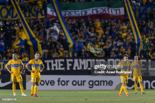 Players of Tigres look dejected after receiving a second goal by Sebastian Giovinco of Toronto during the quarterfinals second leg match between...