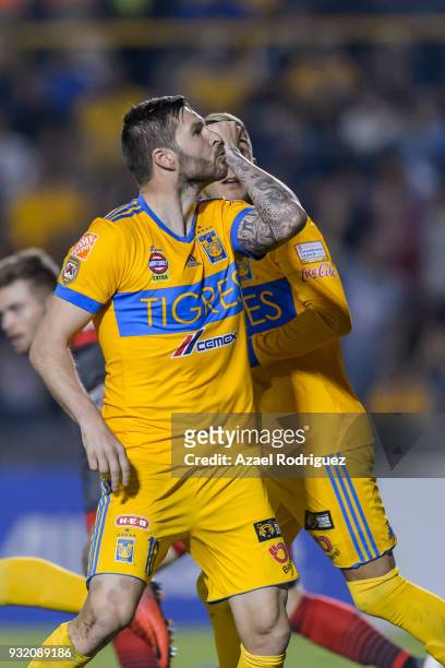 Andre-Pierre Gignac of Tigres celebrates after scoring his team's second goal during the quarterfinals second leg match between Tigres UANL and...