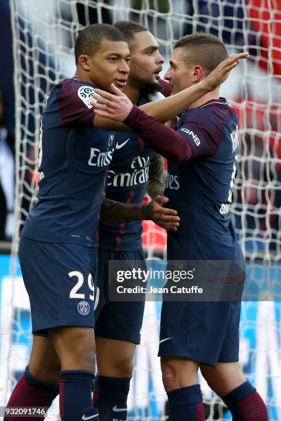 Kylian Mbappe of PSG celebrates his second goal with Layvin Kurzawa, Marco Verratti during the French Ligue 1 match between Paris Saint Germain and...