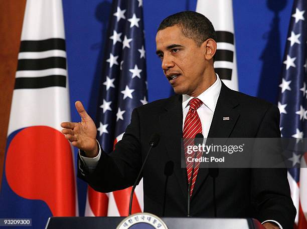 President Barack Obama speaks as he attends a joint press conference with South Korean President Lee Myung-Bak at the presidential house on November...