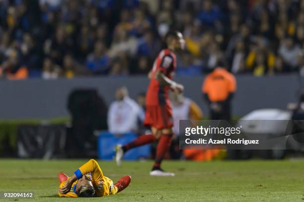 Ismael Sosa of Tigres lies on the ground during the quarterfinals second leg match between Tigres UANL and Toronto FC as part of the CONCACAF...