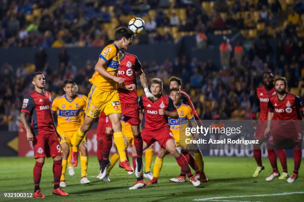 Jurgen Damm of Tigres heads the ball during the quarterfinals second leg match between Tigres UANL and Toronto FC as part of the CONCACAF Champions...