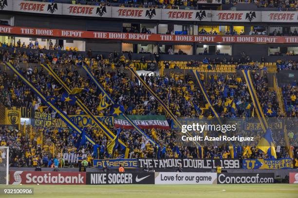 Fans of Tigres cheer the team during the quarterfinals second leg match between Tigres UANL and Toronto FC as part of the CONCACAF Champions League...