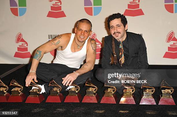 Puerto Rican duo Calle 13, Rene Perez and Eduardo Cabra , pose in the press room after winning 10 Latin Grammy Awards, at the 2009 Latin Grammy...