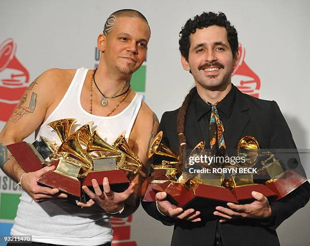 Puerto Rican duo Calle 13, Rene Perez and Eduardo Cabra , pose in the press room after winning 10 Latin Grammy Awards, at the 2009 Latin Grammy...