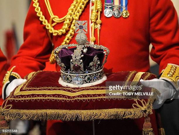 The Imperial State Crown, due to be worn by Brtain's Queen Elizabeth II during her traditional speech for the State Opening of Parliament, is...