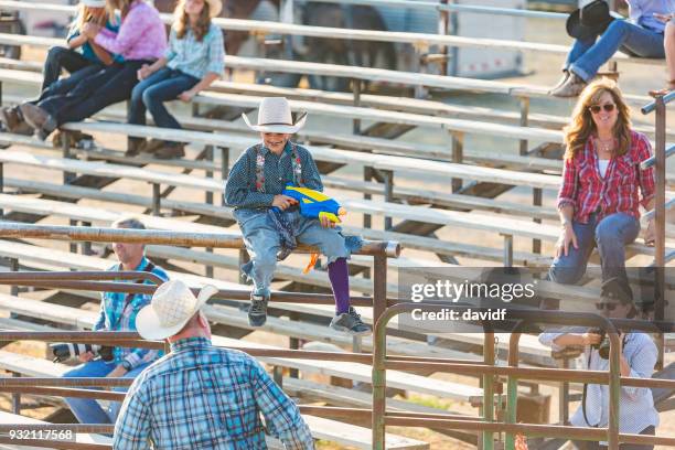 young boy rodeo clown - hobby horse stock pictures, royalty-free photos & images