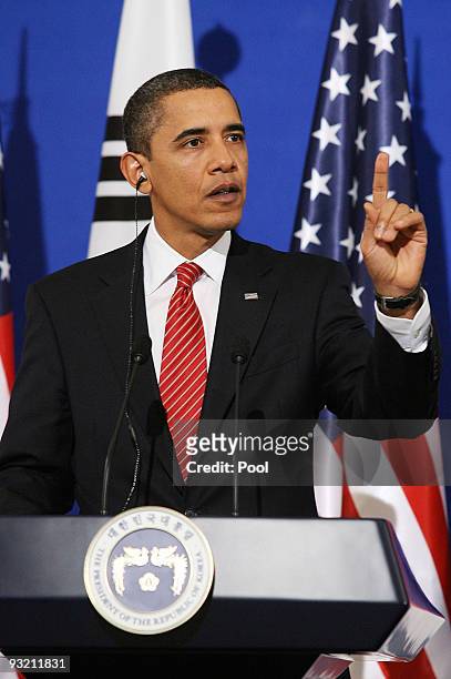 President Barack Obama speaks as he attends a joint press conference with South Korean President Lee Myung-Bak at the presidential house on November...
