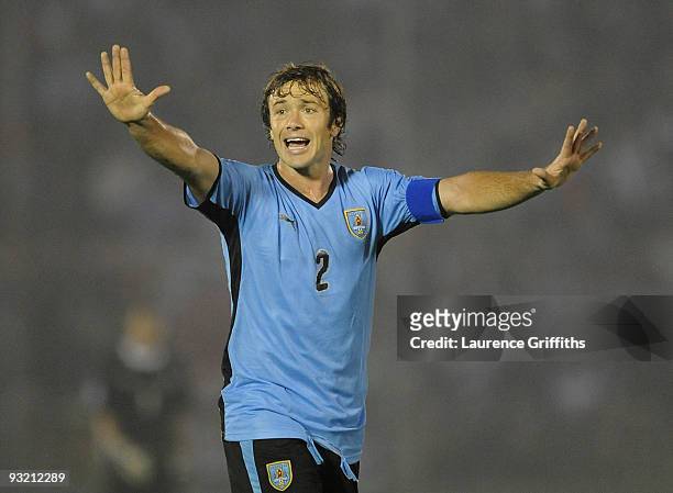 Diego Lugano of Uruguay in action duing the 2010 FIFA World Cup Play Off Second Leg Match between Uruguay and Costa Rica at The Estadio Centenario on...