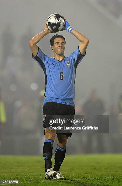 Andres Scotti of Uruguay in action duing the 2010 FIFA World Cup Play Off Second Leg Match between Uruguay and Costa Rica at The Estadio Centenario...