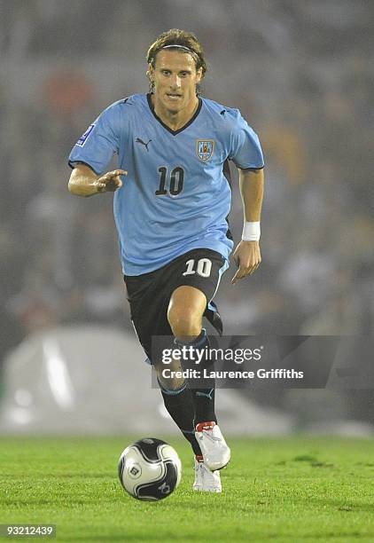 Diego Forlan of Uruguay in action duing the 2010 FIFA World Cup Play Off Second Leg Match between Uruguay and Costa Rica at The Estadio Centenario on...