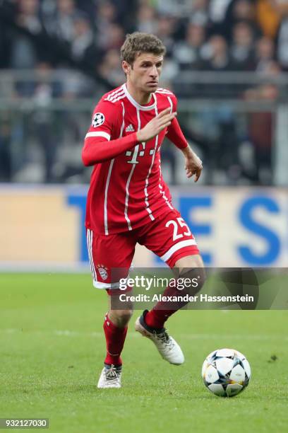 Thomas Mueller of FC Bayern Muenchen runs with the ball during the UEFA Champions League Round of 16 Second Leg match Besiktas and Bayern Muenchen at...