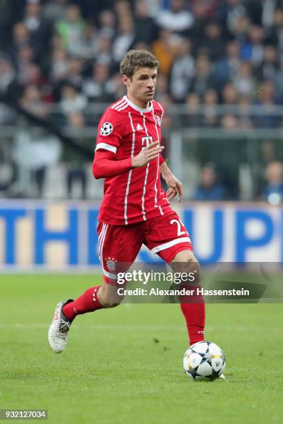 Thomas Mueller of FC Bayern Muenchen runs with the ball during the UEFA Champions League Round of 16 Second Leg match Besiktas and Bayern Muenchen at...