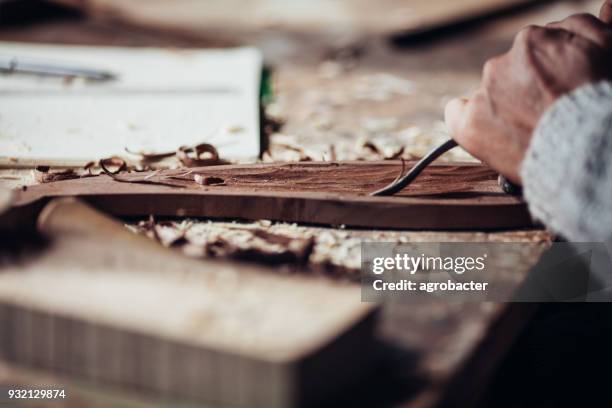 closeup gouge for wood on carpenter workbench - frieze stock pictures, royalty-free photos & images