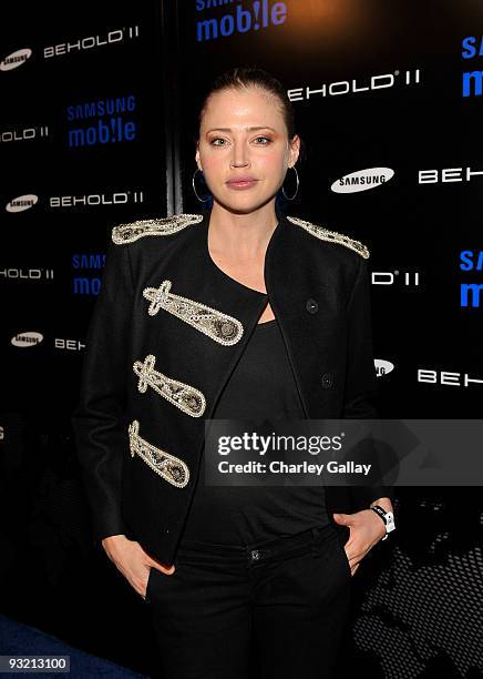 Model Estella Warren arrives at the Samsung Behold II launch event at Boulevard3 on November 18, 2009 in Los Angeles, California.