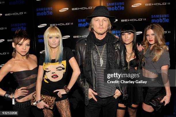 Musician Matt Sorum with the Darling Stilettos arrives at the Samsung Behold II launch event at Boulevard3 on November 18, 2009 in Los Angeles,...