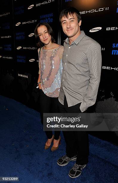 Actress Zelda Williams and Alex Frost arrive at the Samsung Behold II launch event at Boulevard3 on November 18, 2009 in Los Angeles, California.