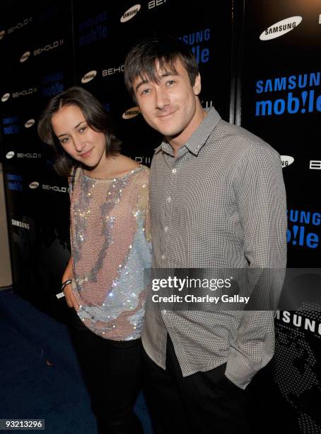 Actress Zelda Williams and Alex Frost arrive at the Samsung Behold II launch event at Boulevard3 on November 18, 2009 in Los Angeles, California.