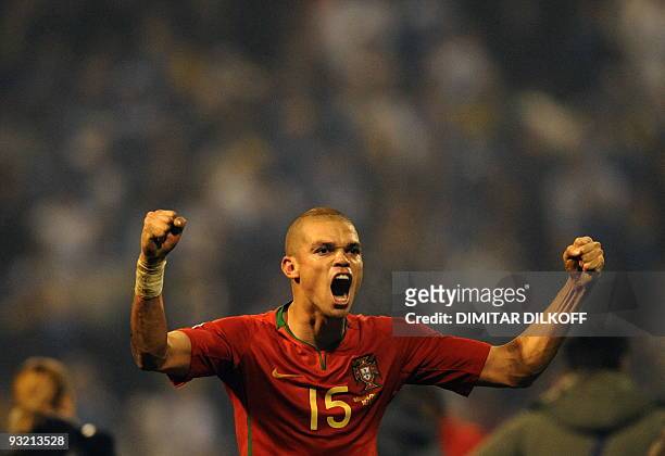 Portugal's Pepe celebrates after winning against Bosnia in their WC2010 play-off football match at Bilino Polje Stadium in Zenica on November 18,...