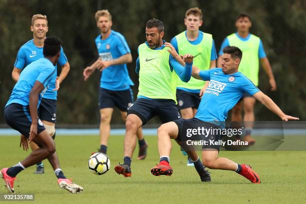 Bruno Fornaroli and Manny Muscat of Melbourne City contest the ball during a Melbourne City FC A-League training session at City Football Academy on...