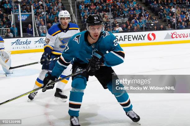 Joonas Donskoi of the San Jose Sharks skates against Jordan Schmaltz of the St. Louis Blues at SAP Center on March 8, 2018 in San Jose, California.