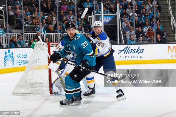 Logan Couture of the San Jose Sharks skates against Vince Dunn of the St. Louis Blues at SAP Center on March 8, 2018 in San Jose, California.