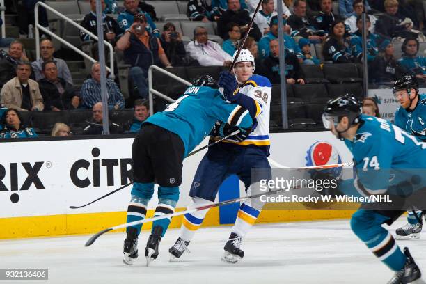 Brenden Dillon of the San Jose Sharks shoves Tage Thompson of the St. Louis Blues at SAP Center on March 8, 2018 in San Jose, California. Brenden...