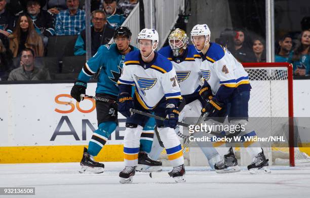 Vladimir Sobotka, Jake Allen and Carl Gunnarsson of the St. Louis Blues defend the net against Evander Kane of the San Jose Sharks at SAP Center on...