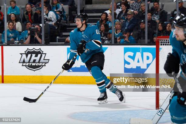 Justin Braun of the San Jose Sharks skates with the puck against the St. Louis Blues at SAP Center on March 8, 2018 in San Jose, California. Justin...