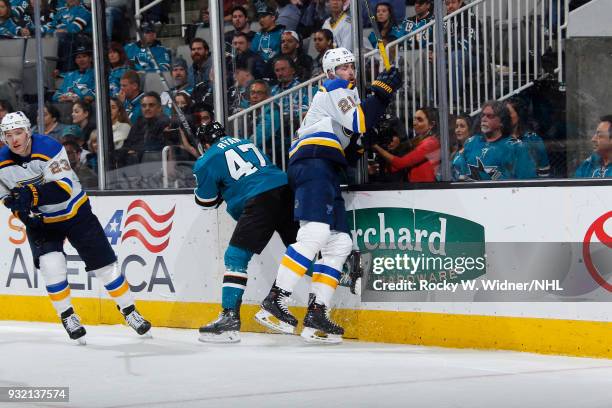 Joakim Ryan of the San Jose Sharks collides into Patrik Berglund of the St. Louis Blues at SAP Center on March 8, 2018 in San Jose, California.