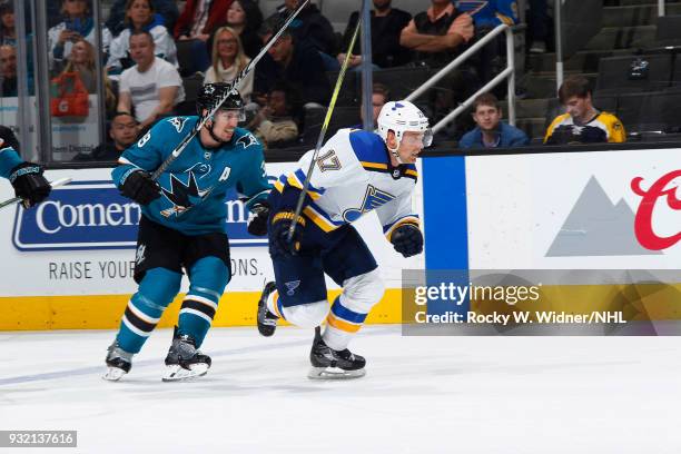 Jaden Schwartz of the St. Louis Blues skates against Logan Couture of the San Jose Sharks at SAP Center on March 8, 2018 in San Jose, California.