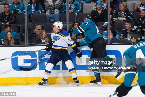 Jaden Schwartz of the St. Louis Blues skates against Justin Braun of the San Jose Sharks at SAP Center on March 8, 2018 in San Jose, California....