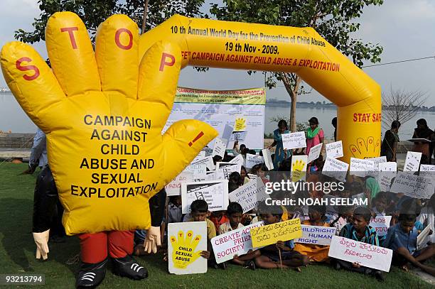 Indian children participate in a "Stay Safe" campaign against child abuse and sexual exploitation in Hyderabad on November 19, 2009 on the occasion...