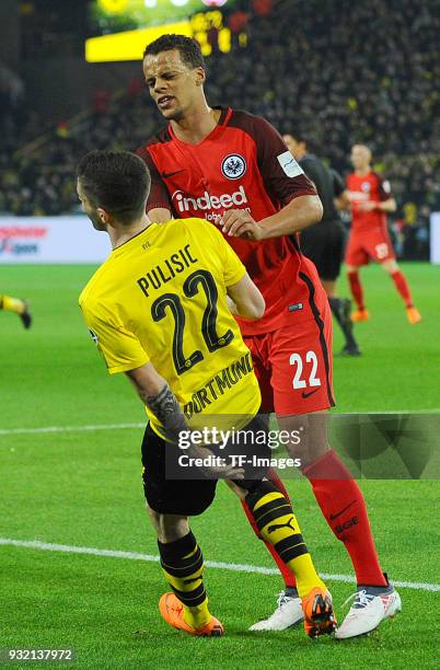 Christian Pulisic of Dortmund and Timothy Chandler of Frankfurt battle for the ball during the Bundesliga match between Borussia Dortmund and...