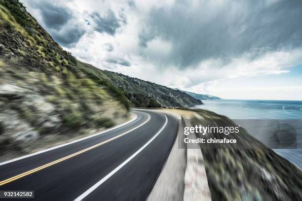 coastal road,blurred motion - coastal road stock pictures, royalty-free photos & images