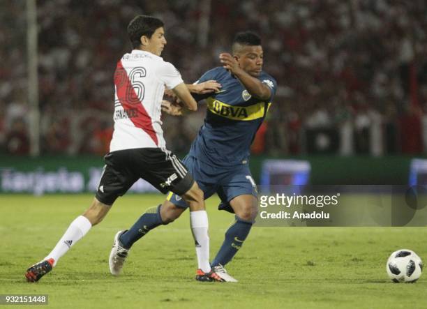 Frank Fabra of Boca Juniors fights for the ball with Ignacio Gonzalez , of River Plate, during the final match of the Argentine Supercup at the...