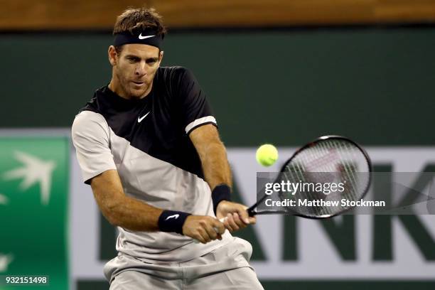 Juan Martin Del Potro of Argentina returns a shot to Leonardo Mayer of Argentina during the BNP Paribas Open at the Indian Wells Tennis Garden on...