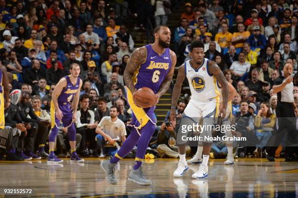 Derrick Williams of the Los Angeles Lakers handles the ball against the Golden State Warriors on March 14, 2018 at ORACLE Arena in Oakland,...